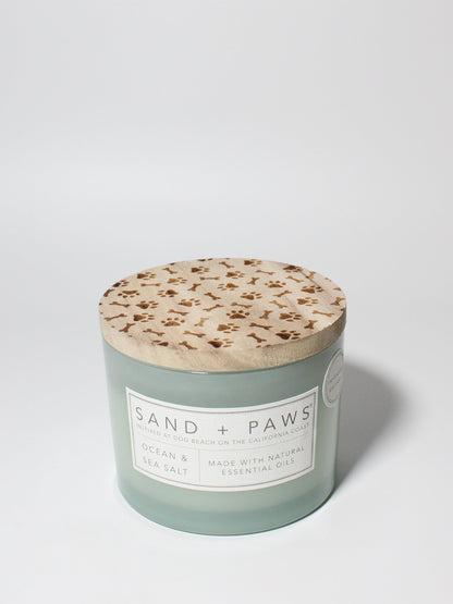 Sand + Paws Ocean & Sea Salt 12 oz scented candle Seaglass vessel with Carved Paws and Bones lid