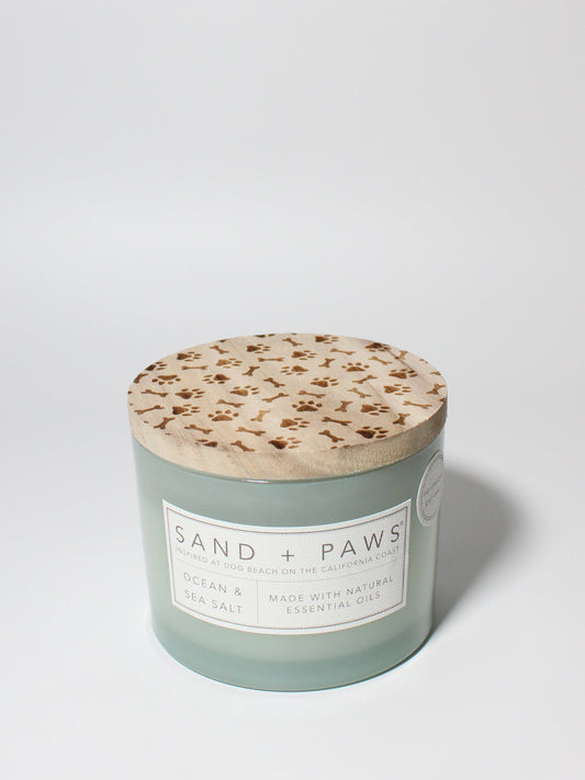 Sand + Paws Ocean & Sea Salt 12 oz scented candle Seaglass vessel with Carved Paws and Bones lid