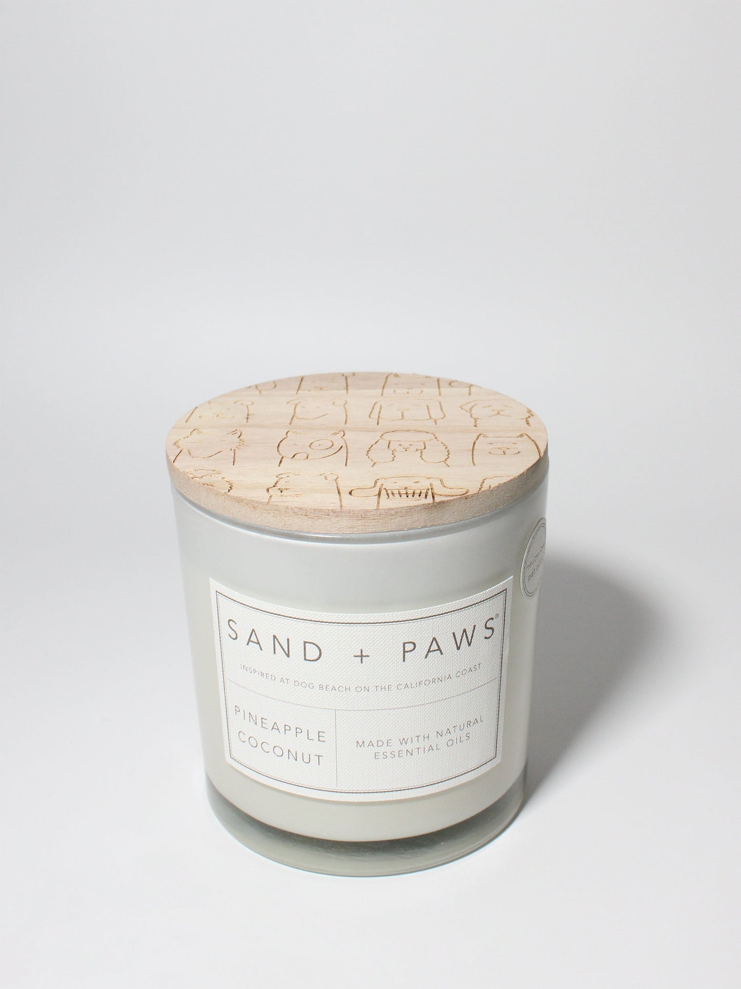 Sand + Paws Pineapple Coconut 21 oz scented candle White vessel with Multi-Breed carved wood lid