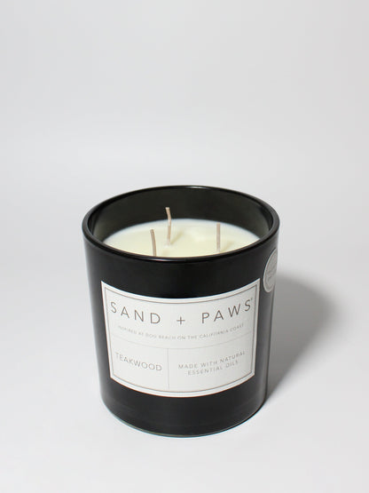 Sand + Paws Teakwood 21 oz scented candle Black vessel with Paw in Heart lid