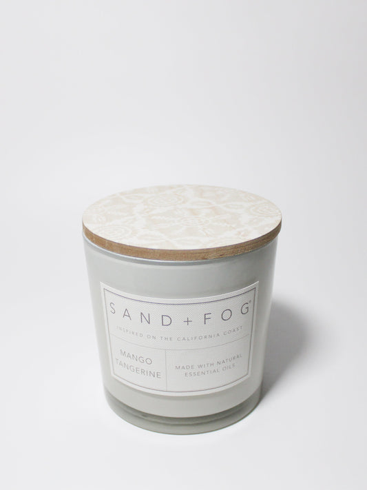 Mango Tangerine 21 oz candle with a wood lid